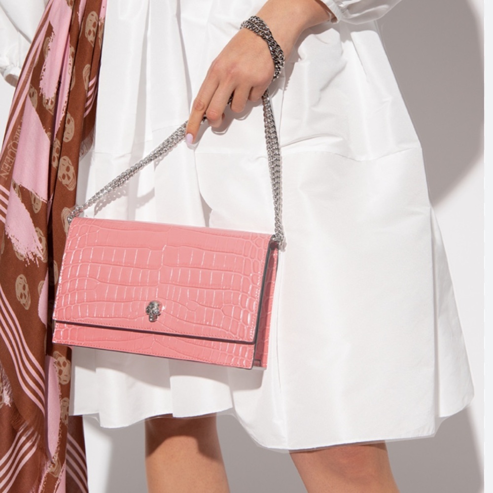 Alexander McQueen small skull crossbody and shoulder bag in coral
